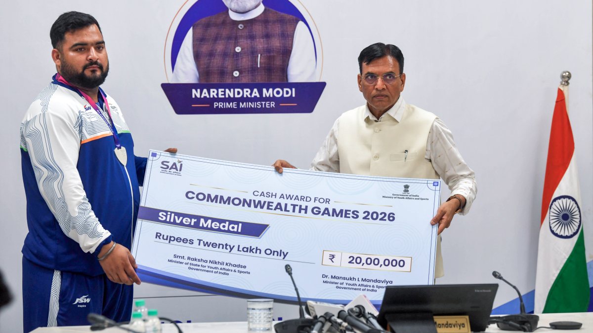 Mansukh Mandaviya felicitates CWG silver medallist Lovepreet Singh