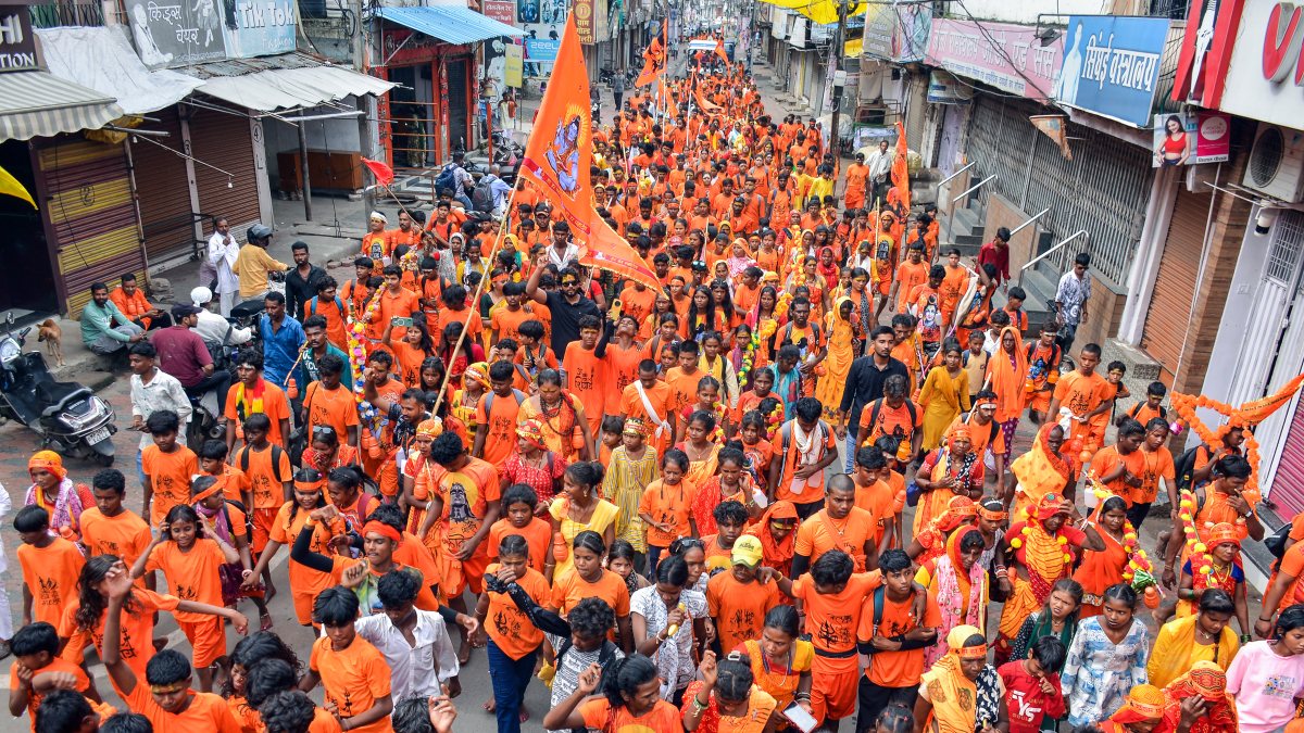 Devotees carry Narmada water in Shravan kanwar procession