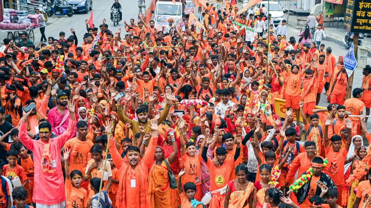 Devotees carry Narmada water in Shravan kanwar procession