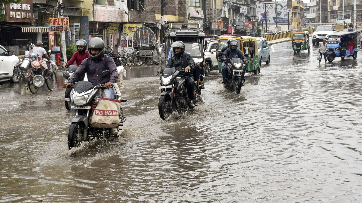 Patna commuters wade through waterlogged roads amid heavy rain