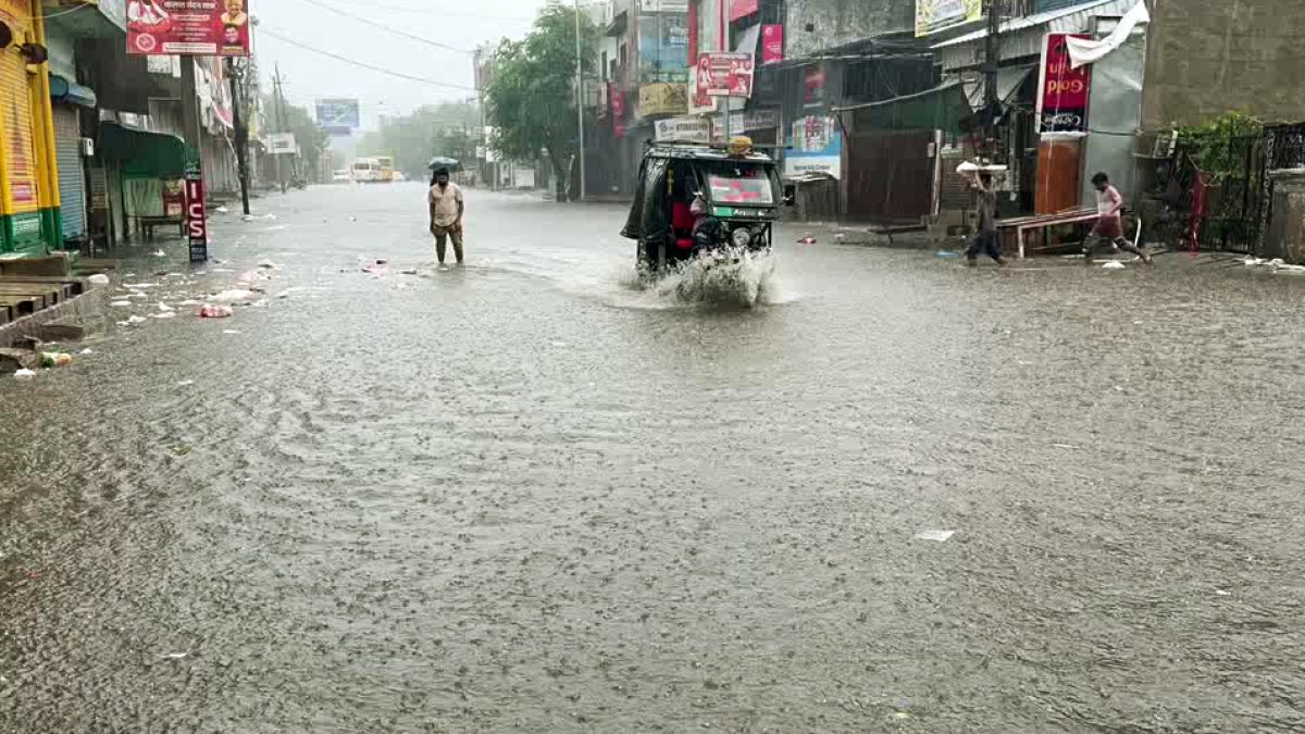 Heavy rains inundate streets in Jhajjar, commuters wade through water