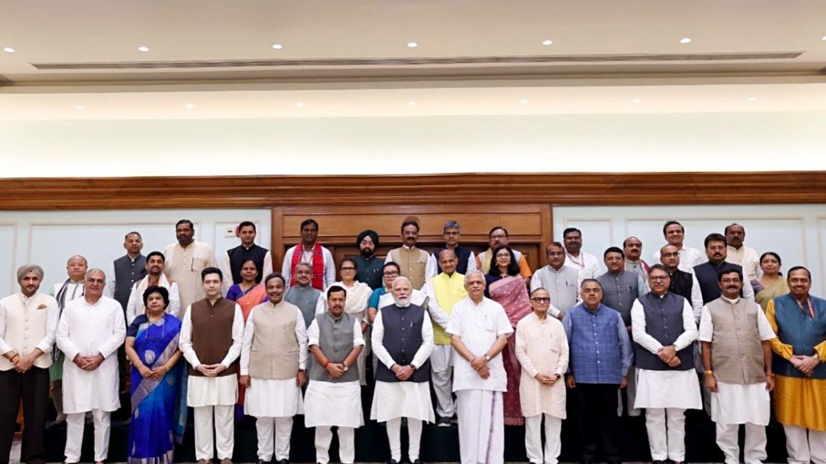 Modi poses with newly elected BJP Rajya Sabha MPs