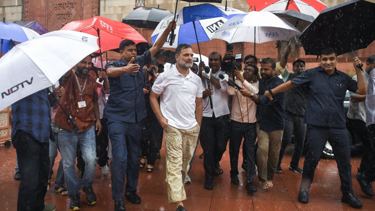 Rahul Gandhi leaves Parliament amid monsoon rain