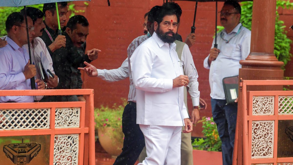 Maharashtra Deputy CM Shinde at Parliament amid monsoon rain