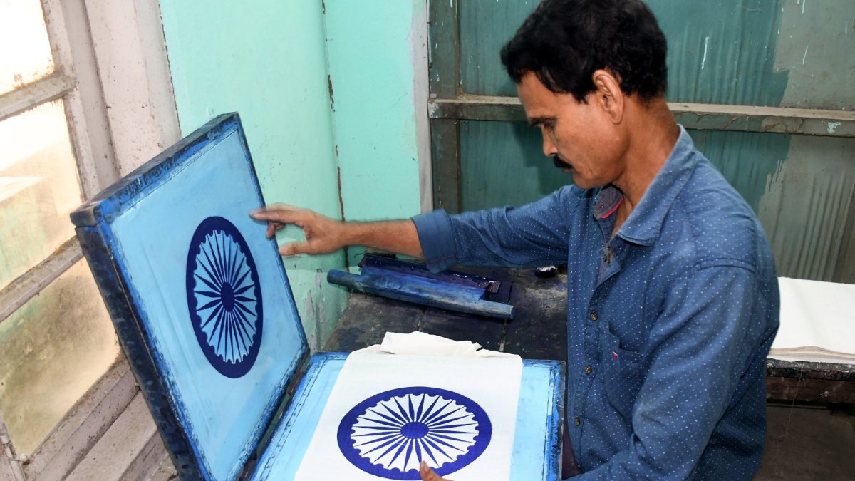Assam workers prepare national flags ahead of Independence Day