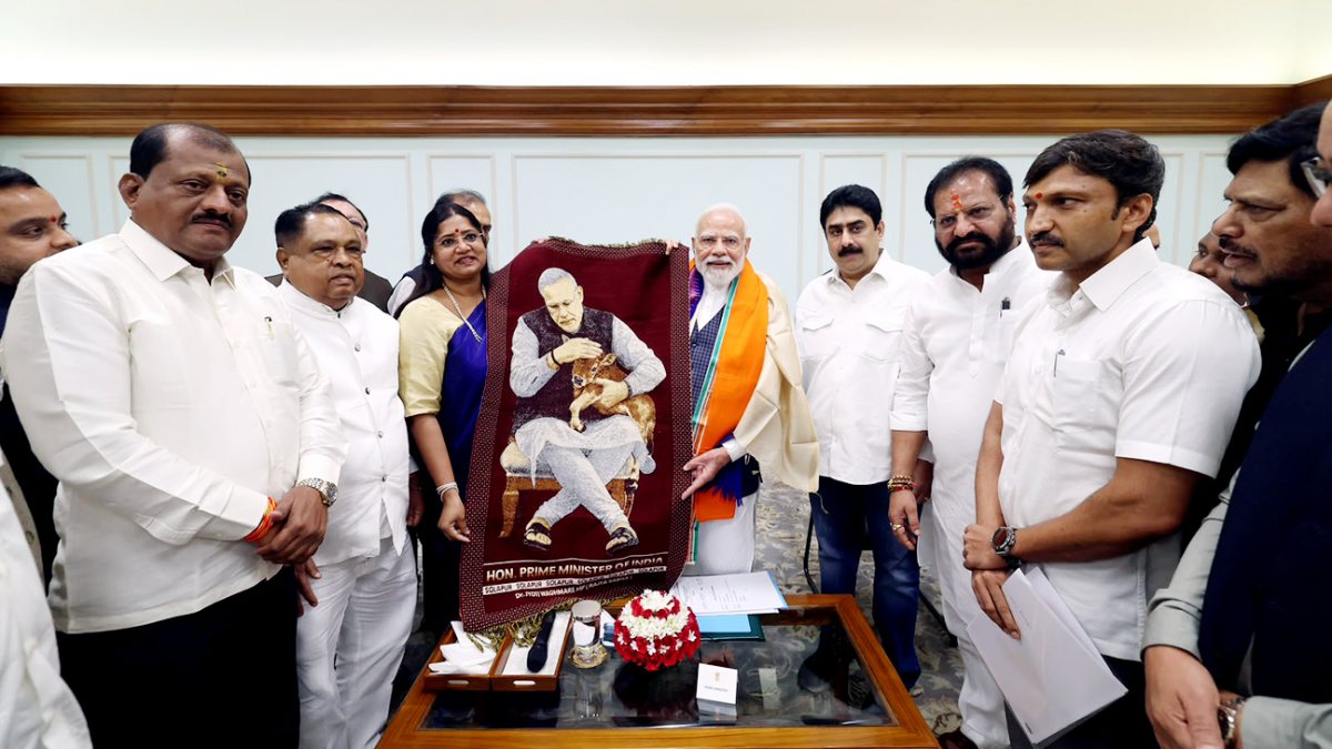 PM Modi receives Solapur handloom Dhawal on National Handloom Day