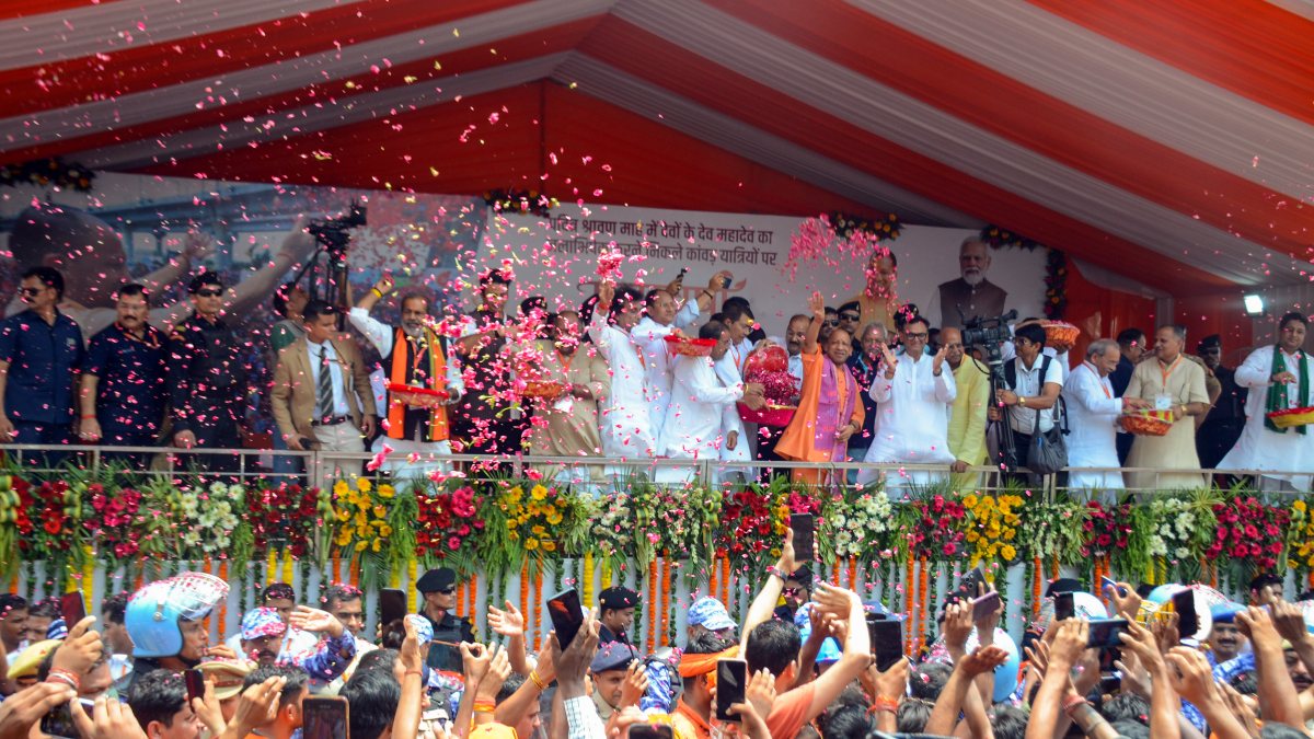 Yogi Adityanath showers flower petals on Kanwariyas in Meerut