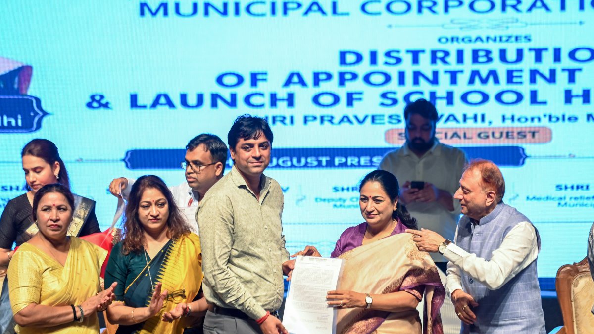 Delhi CM hands appointment letters to sanitation workers