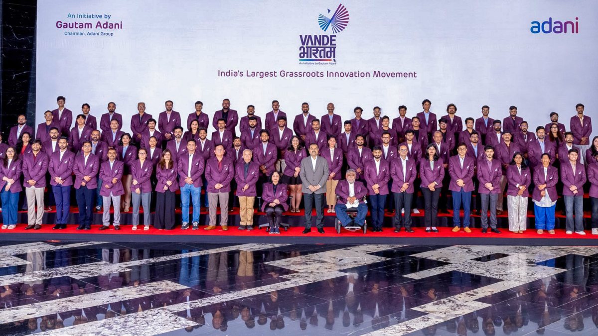 Gautam Adani poses with innovators at Ahmedabad grassroots event