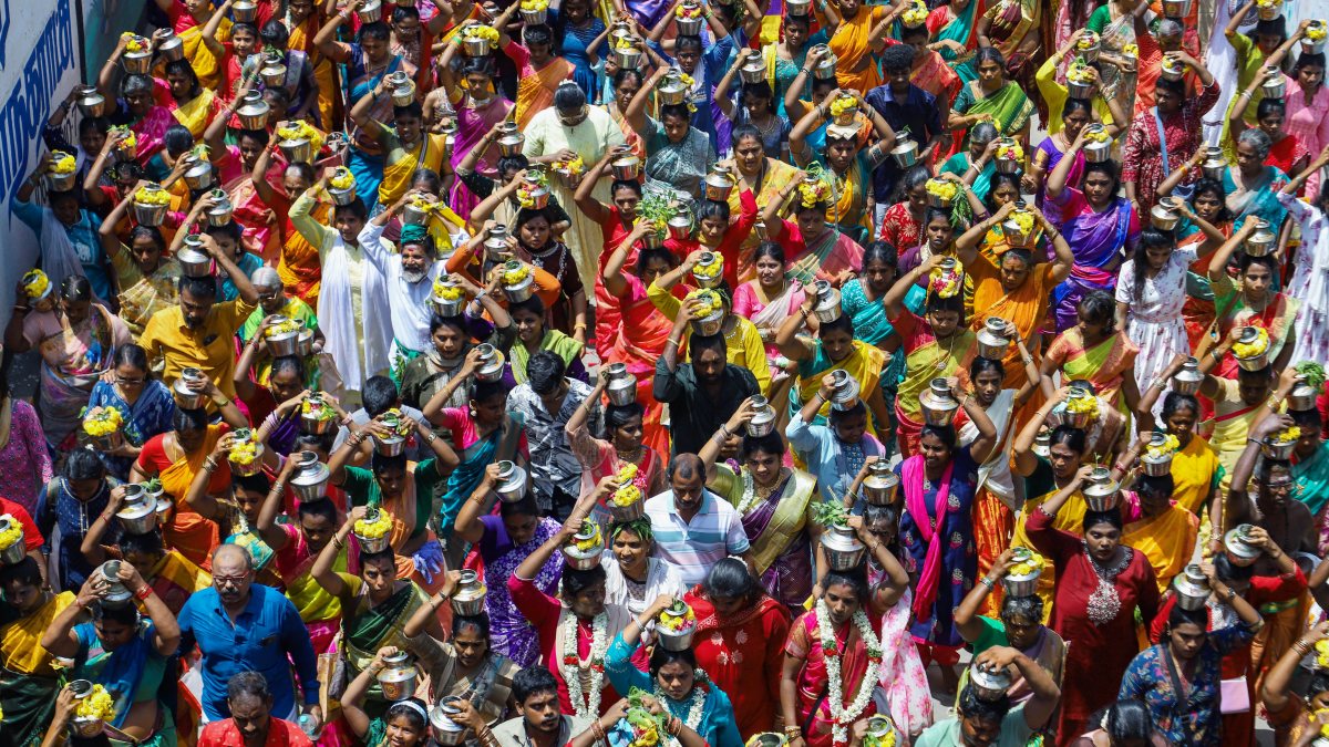 Devotees carry milk pots in Chennai temple ritual