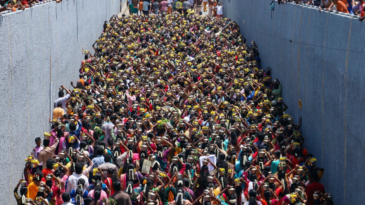 Devotees carry milk pots in Chennai temple ritual procession