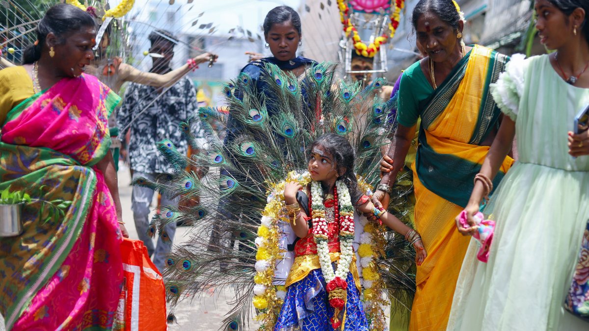 Child dressed as Lord Murugan joins Chennai temple procession