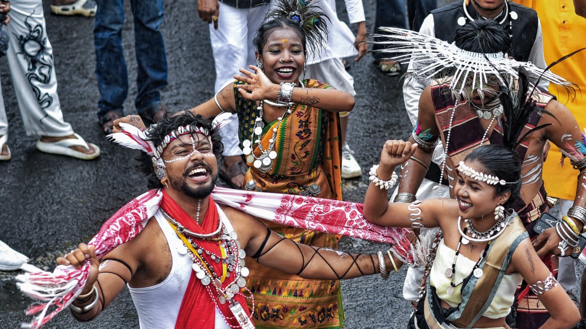Tribal dancers perform at World Adivasi Day in Nagpur
