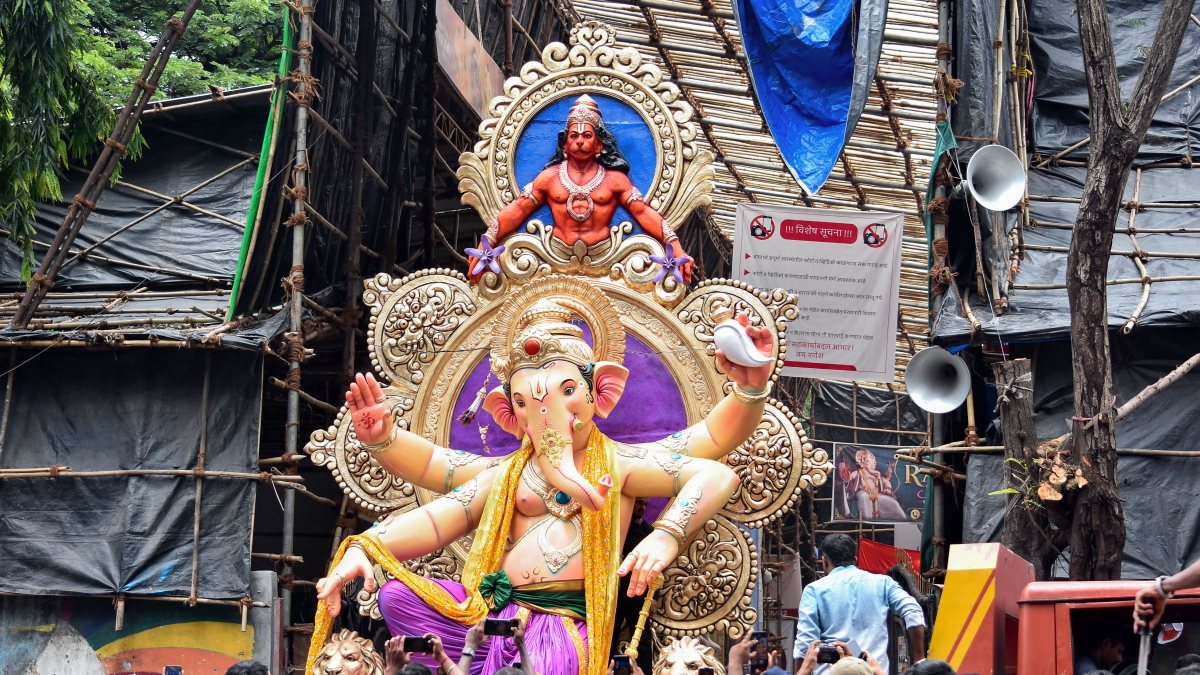 Devotees click photos of Lord Ganesh idol in Mumbai pandal