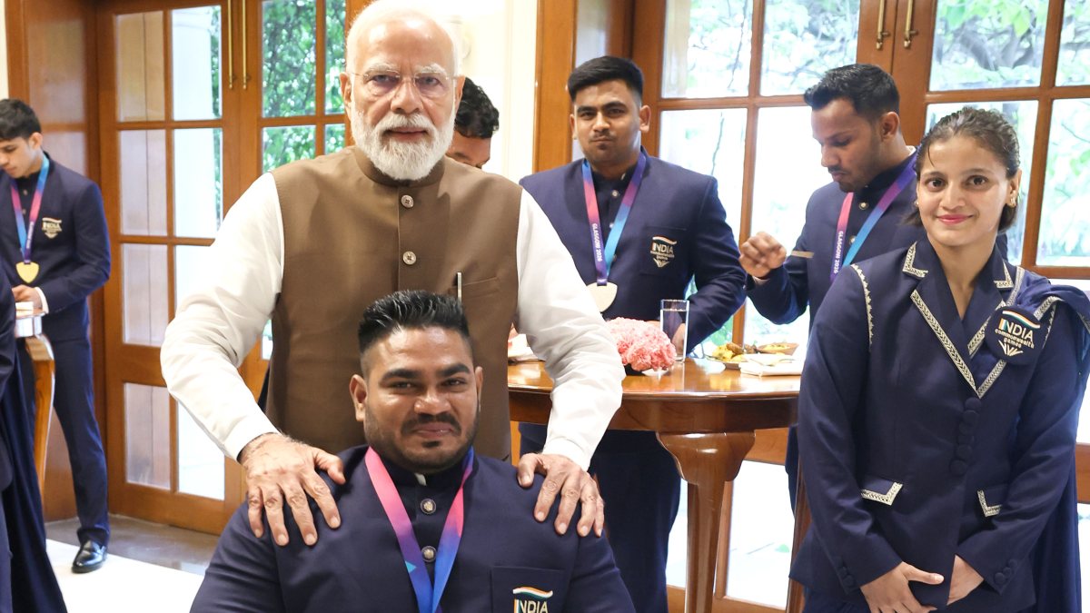 PM Modi meets Commonwealth Games medalist Jhandu Kumar in Delhi