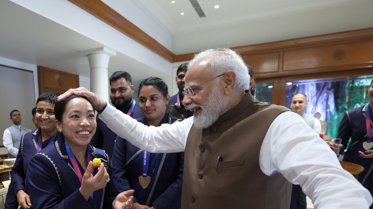 PM Modi offers sweets to CWG gold medallist Mirabai Chanu