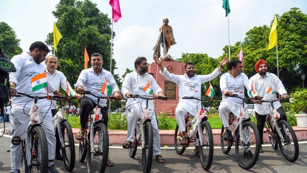 AAP MLAs cycle protest at Delhi Assembly session
