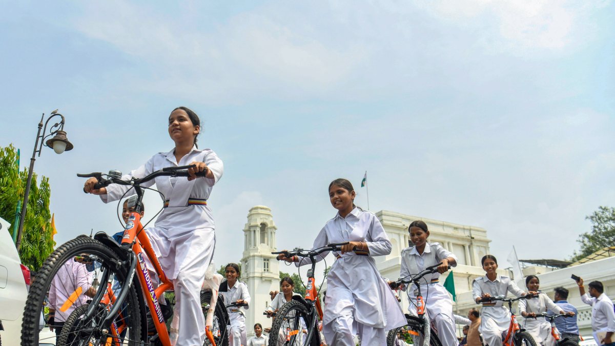 Female students receive bicycles under Vidya Vahini Yojana in Delhi