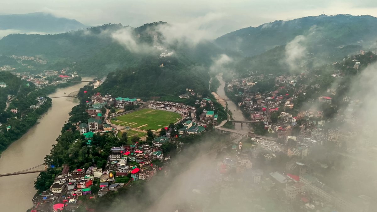Fog shrouds Mandi town and hills, enhancing scenic beauty