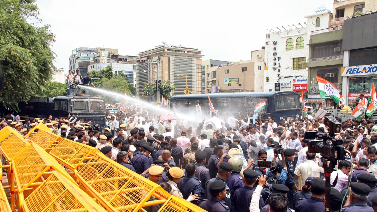 Police water cannons disperse Congress workers at Jaipur rally