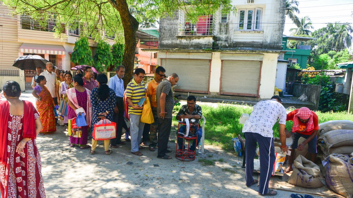 Siliguri residents queue for government ration distribution