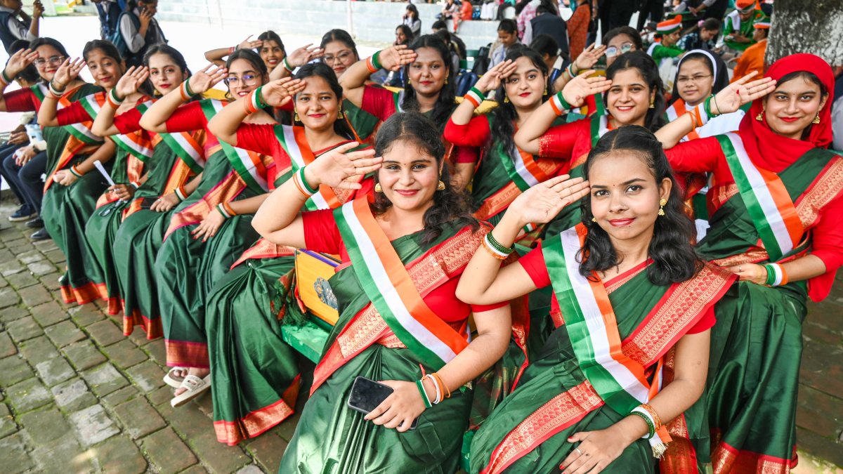 Students salute during patriotic song contest at Patna college