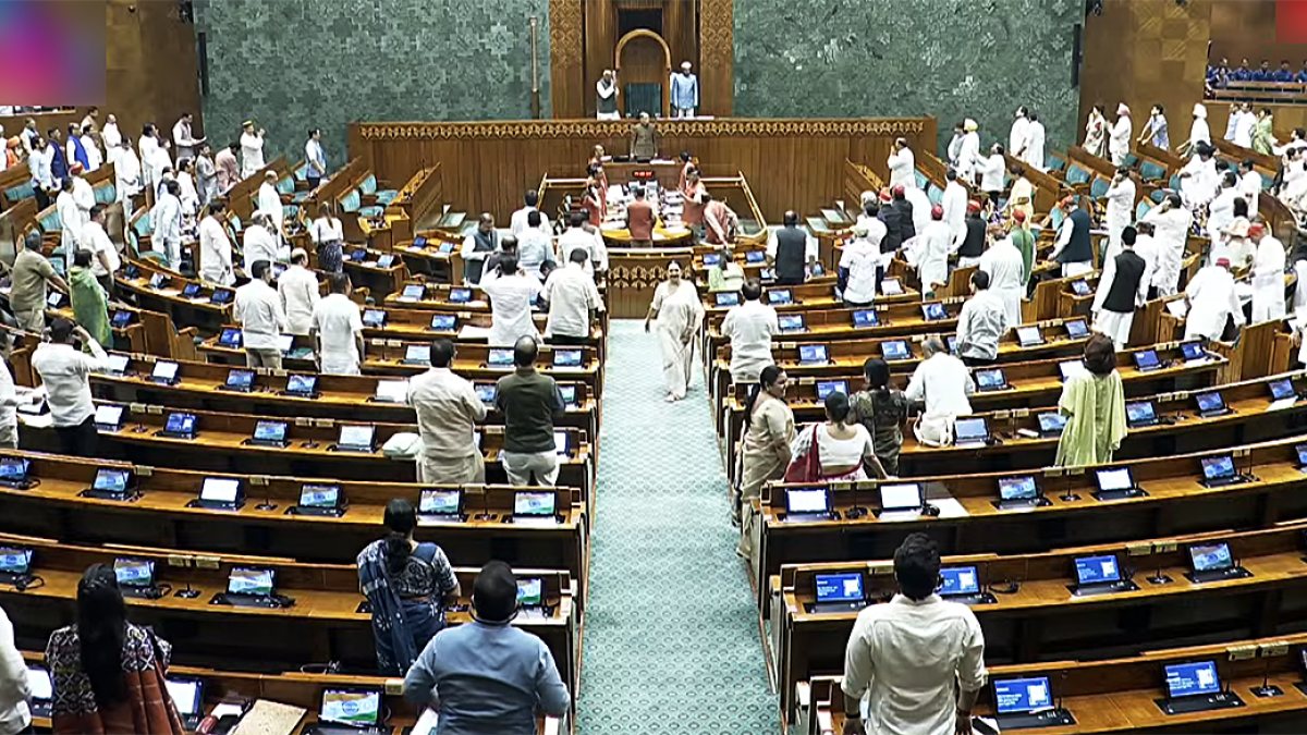Parliamentarians stand as presiding officer arrives for Lok Sabha session