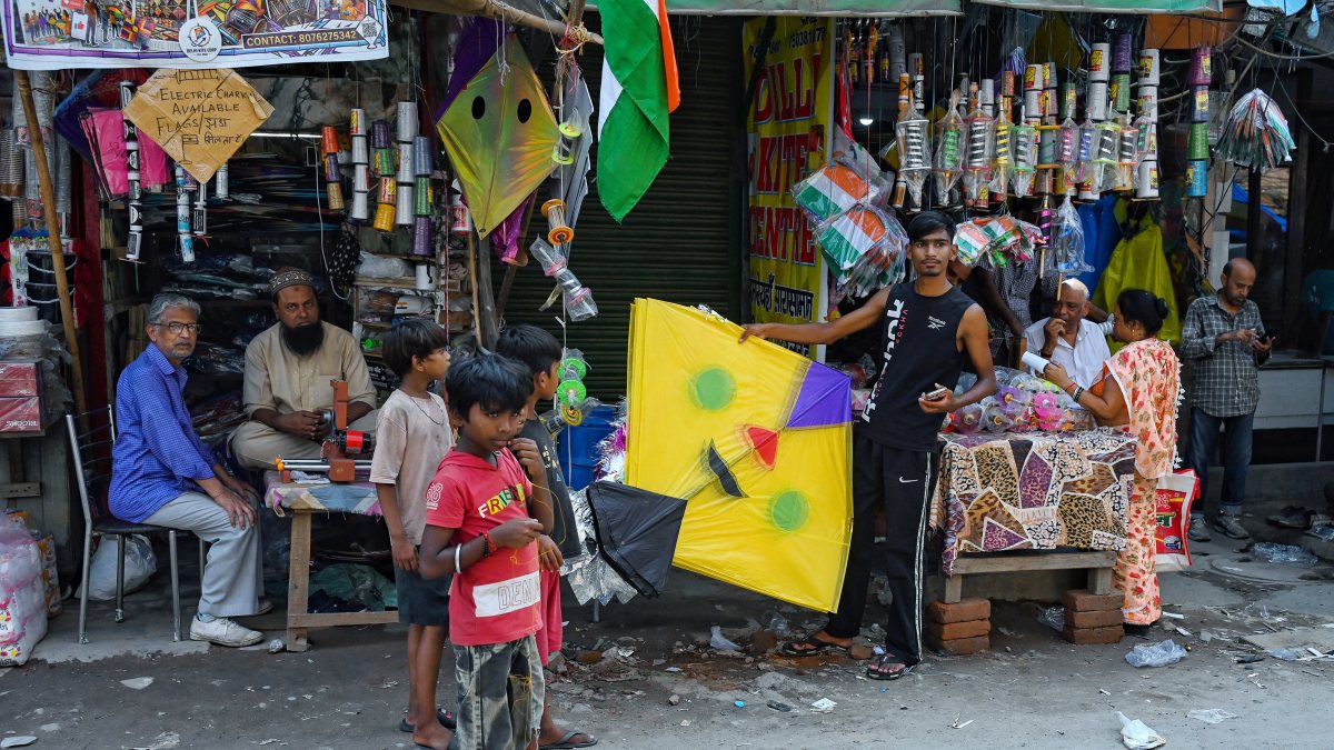 Children shop for kites ahead of Independence Day in Delhi