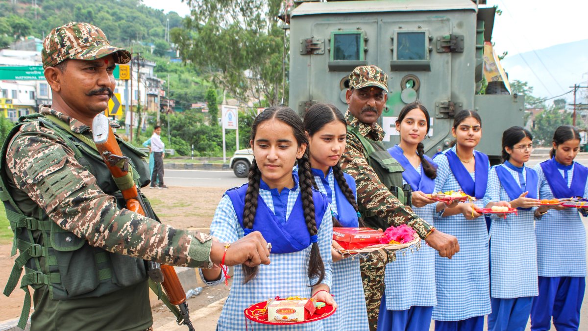 CRPF personnel get rakhis from girl students in Udhampur