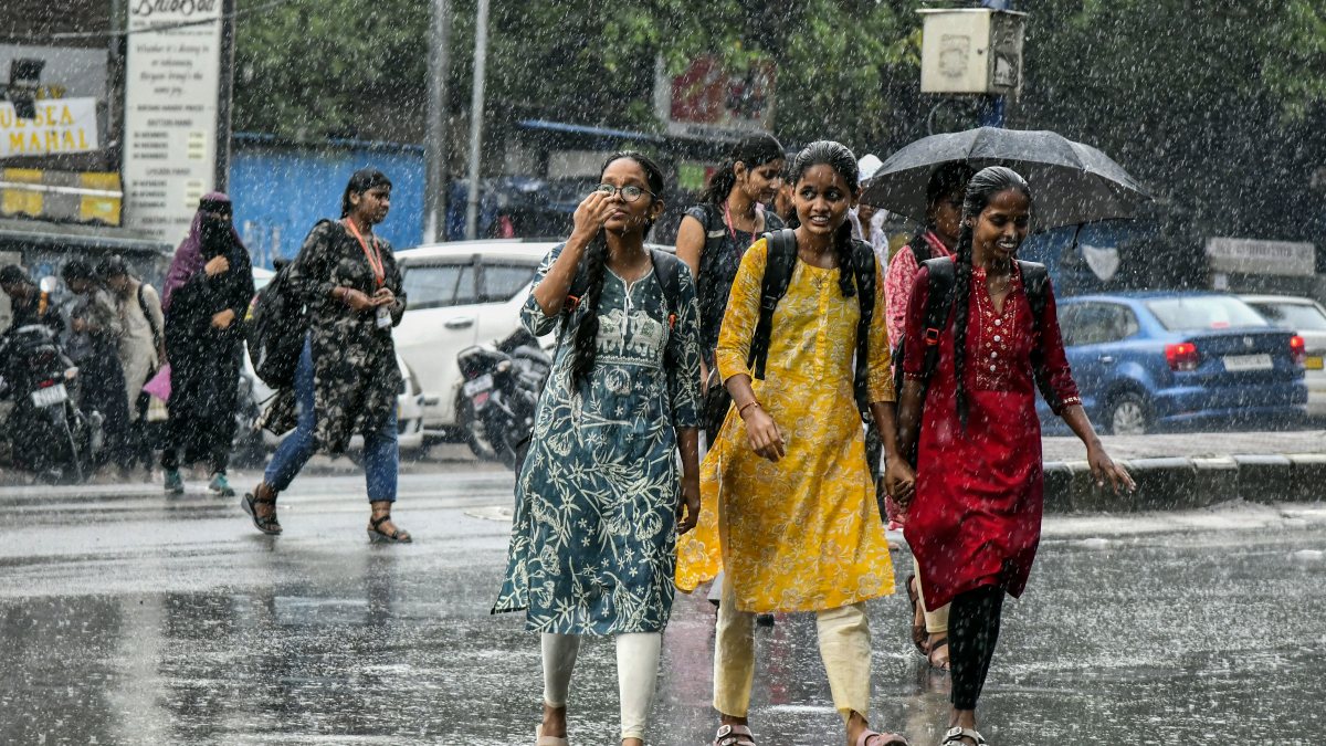 Hyderabad commuters navigate rain-slicked roads amid heavy downpour