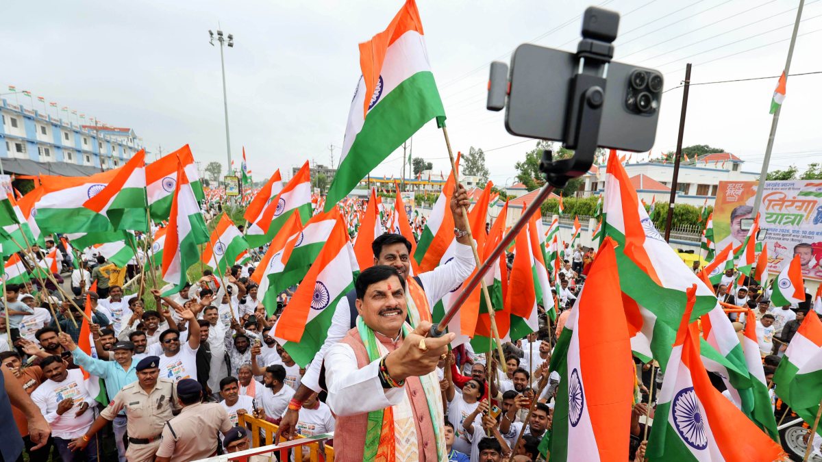 MP CM Yadav clicks selfie with BJP MLA during Tiranga Yatra