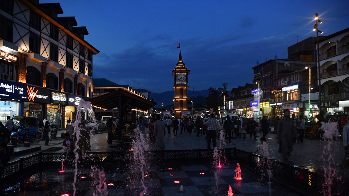 Illuminated clock tower shines at Lal Chowk on Independence Day eve