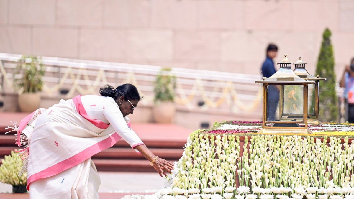 President Droupadi Murmu lays a wreath as she pays homage to the martyrs at the…