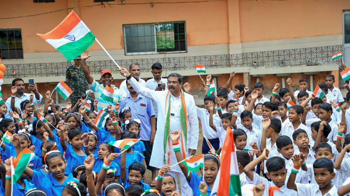 BJP MP Pradhan waves tricolour with children on I-Day in Deogarh