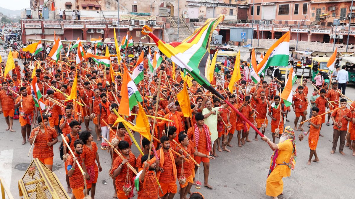 Kanwar pilgrims march with national flags in Jaipur