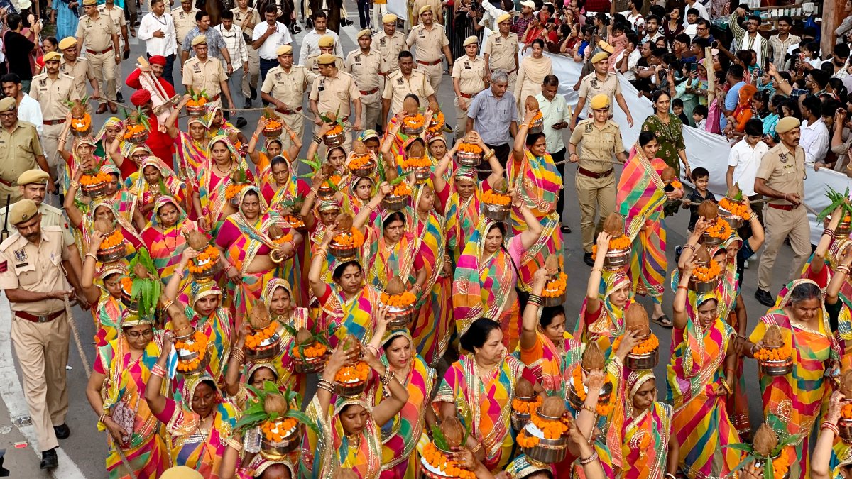 Women devotees carry kalash in Teej procession in Jaipur