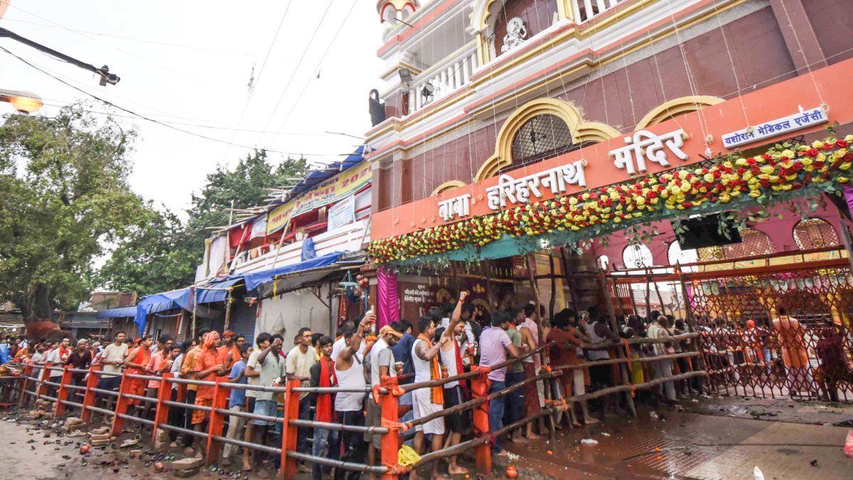 Devotees queue for prayers on Sawan's third Monday at Saran temple