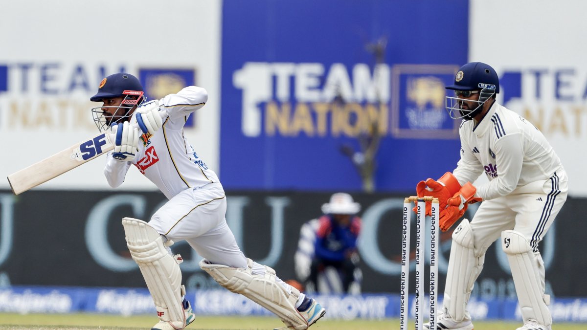 Dhananjaya de Silva plays a shot on day three of first India-Sri Lanka Test