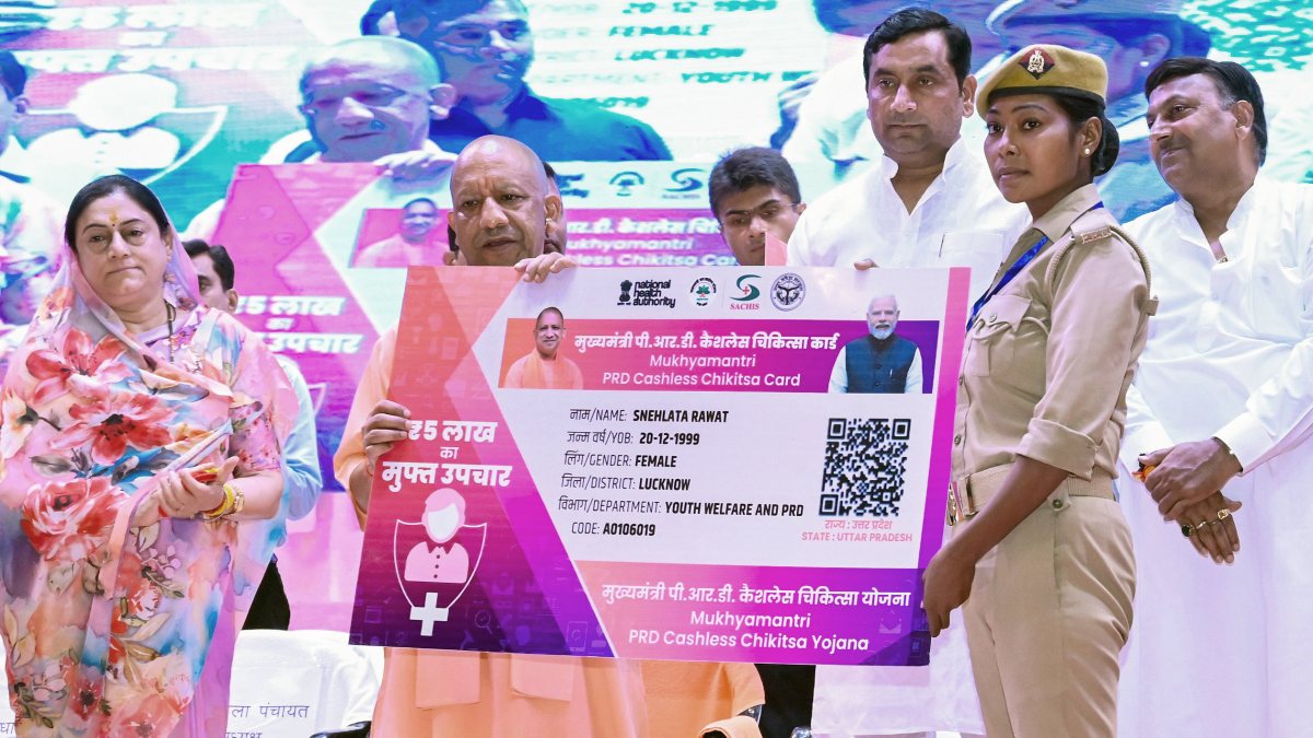 UP CM Yogi presents cashless health cards at PRD meet