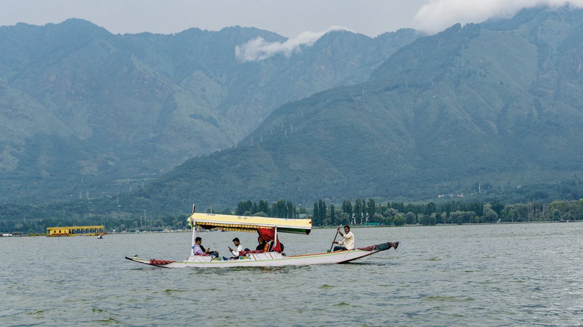 Tourists enjoy Shikara ride on Dal Lake in Srinagar