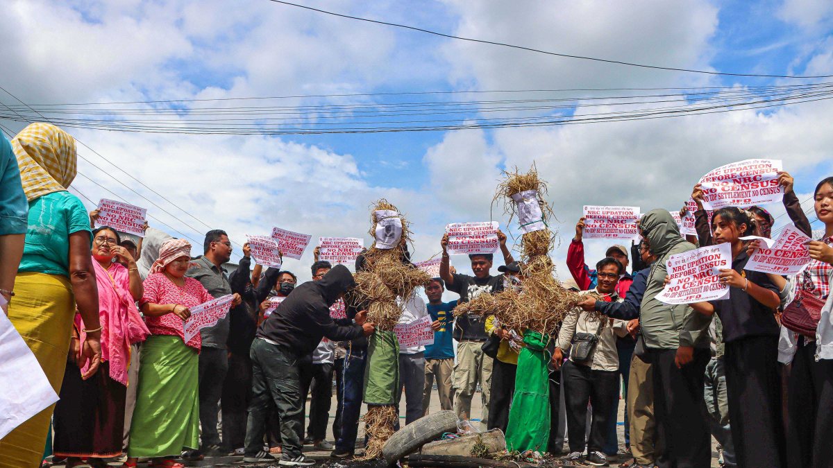 Protesters torch effigies during delimitation strike in Imphal