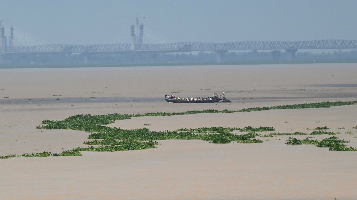 Boat sails on overflowing Ganga in Patna