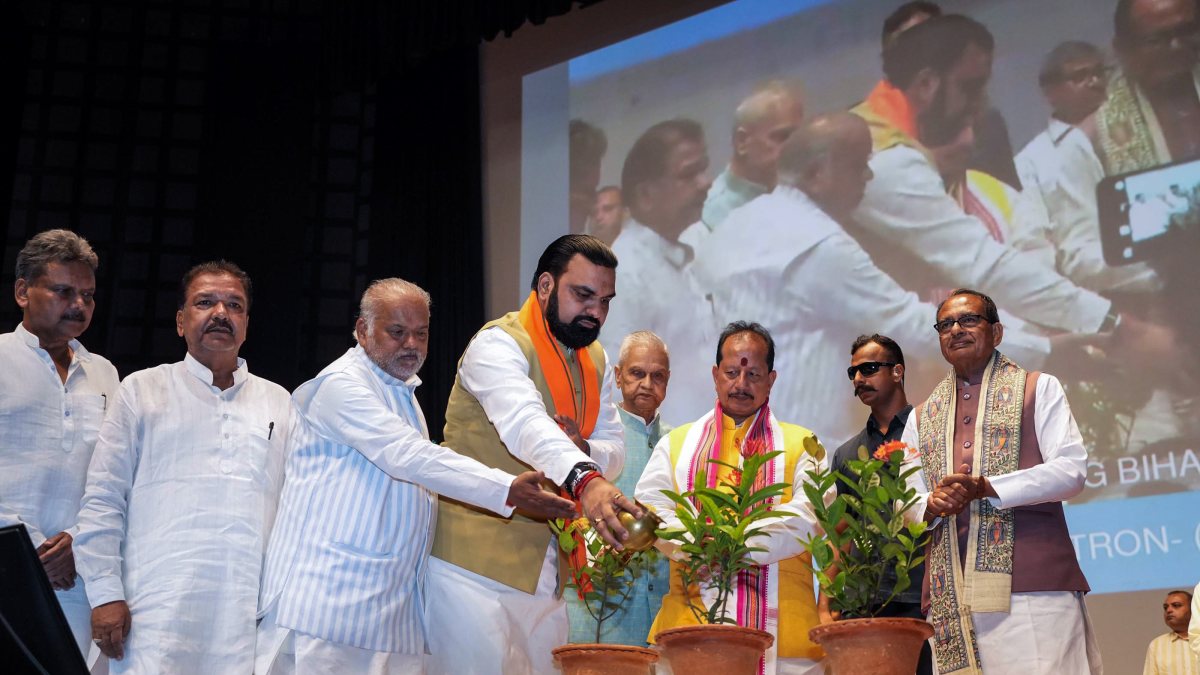 Bihar CM waters plants at PMAY-G Griha Pravesh ceremony in Patna