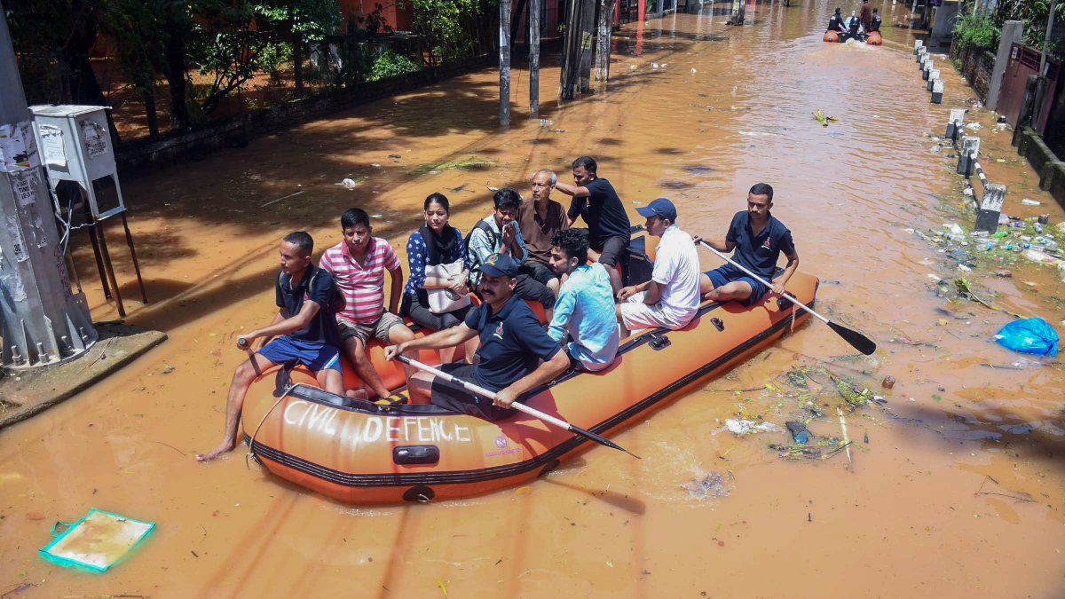 Rescuers evacuate residents from flooded Guwahati locality