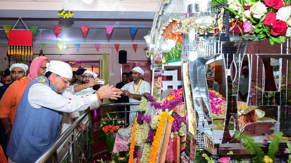 Uttarakhand Chief Minister Pushkar Singh Dhami pays floral tributes to the…