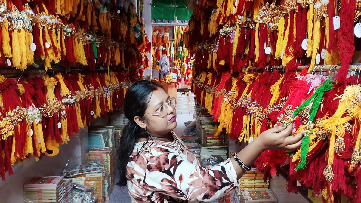 Woman picks rakhis at Prayagraj market ahead of Raksha Bandhan
