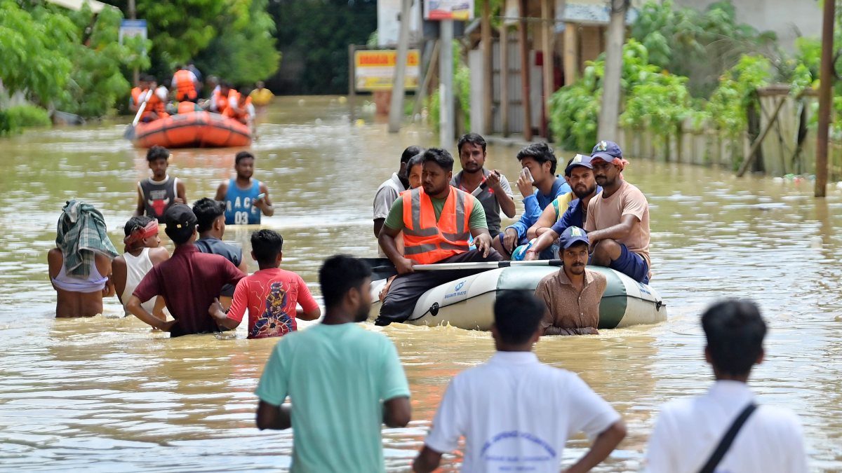 Flood-hit villagers rescued by boat in Tripura's Agartala