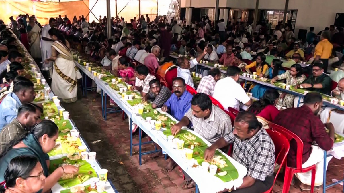 Devotees relish Onam Sadya on banana leaves at Thrikkakara Temple