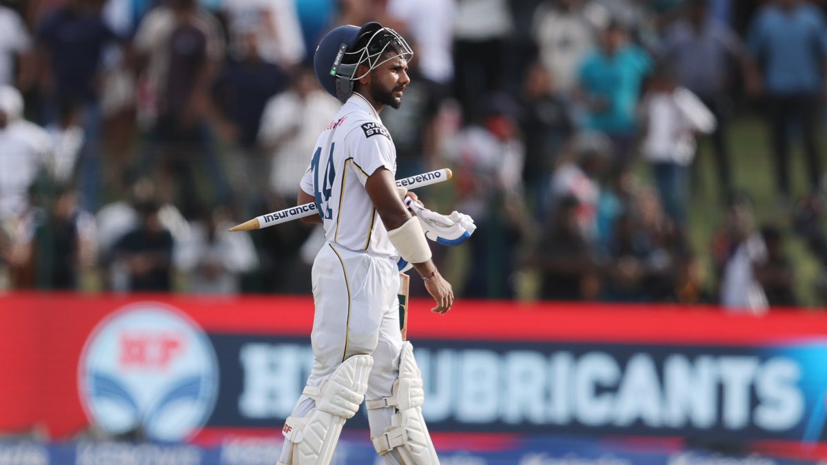 Sri Lanka's Sonal Dinusha walks back after 2nd test end