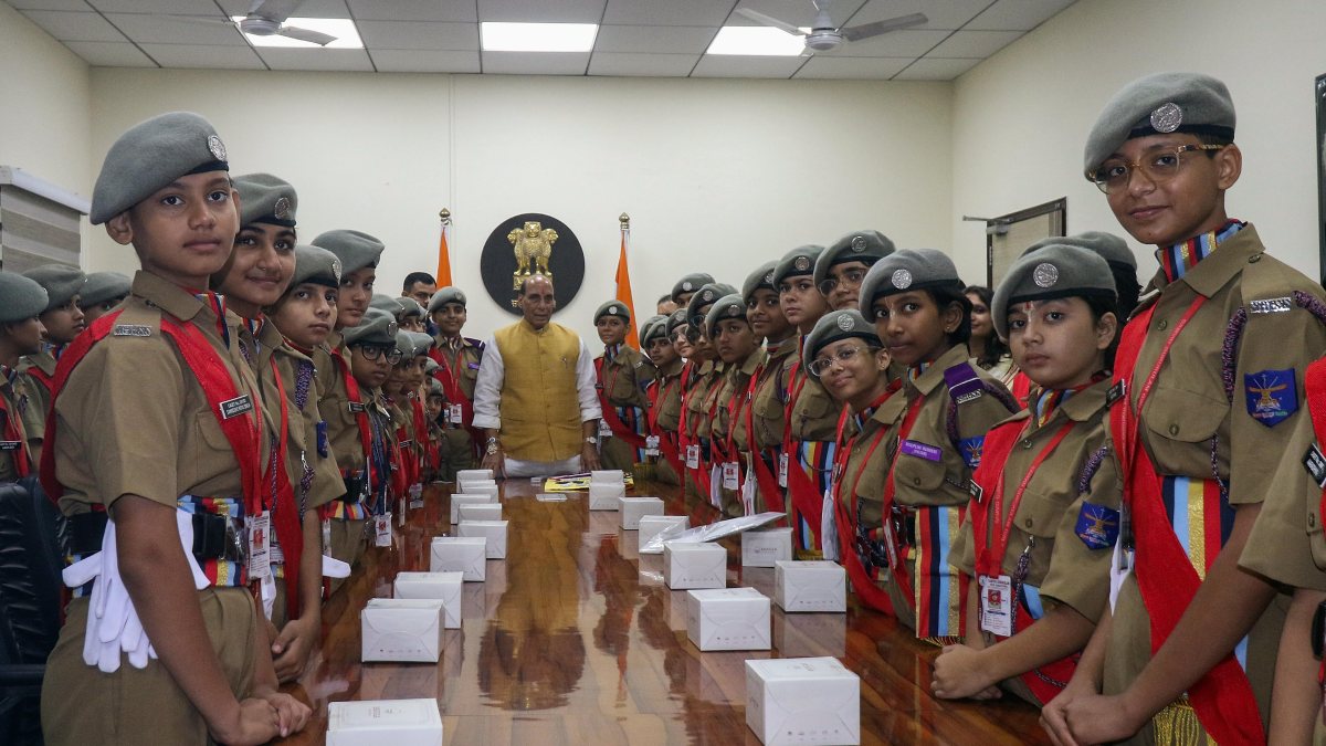 Defence Minister Rajnath Singh poses with NCC cadets on Raksha Bandhan